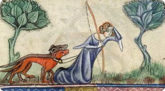 Femme chassant avec deux chiens